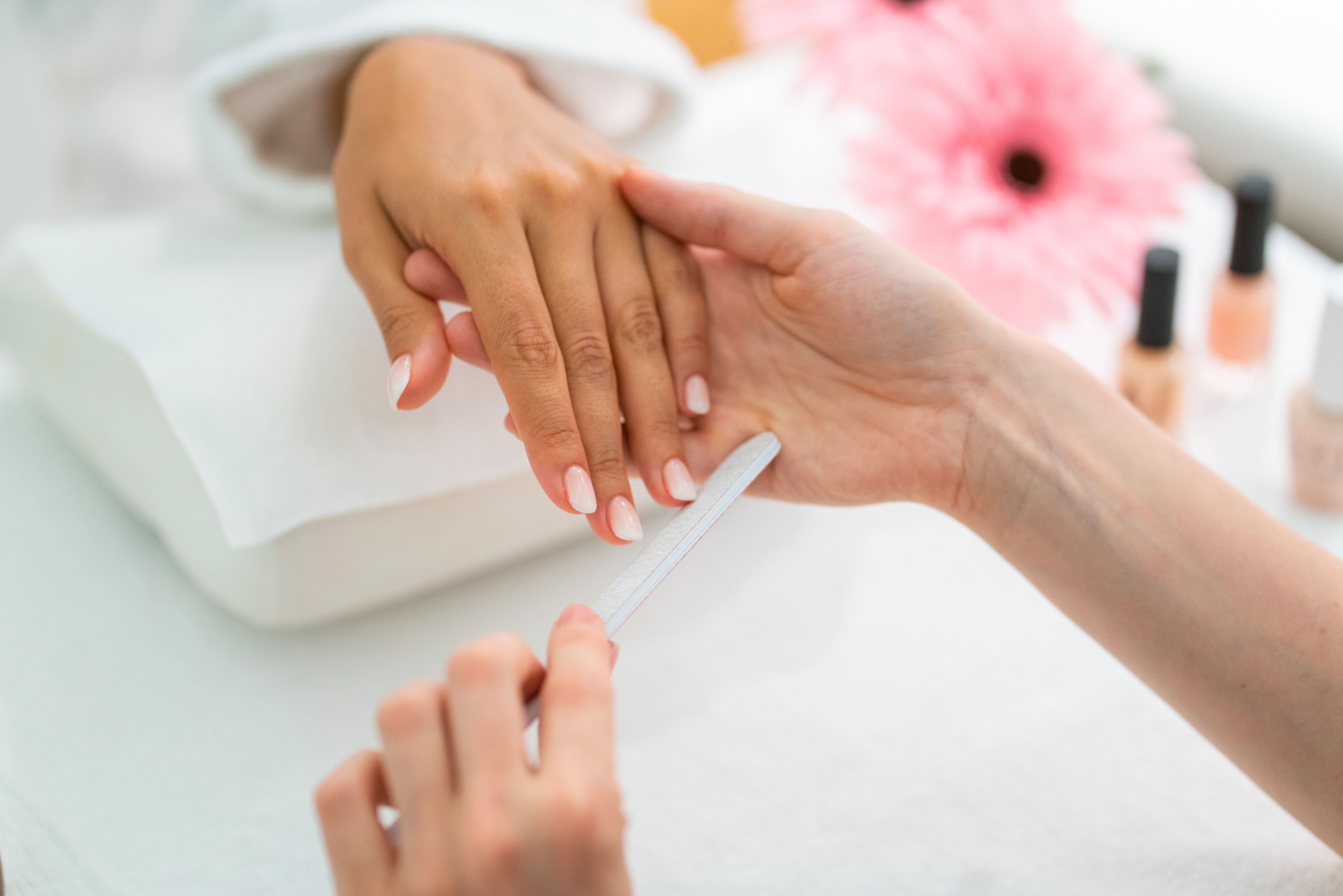 Woman hand manicure Splash and Spa Tamaro
